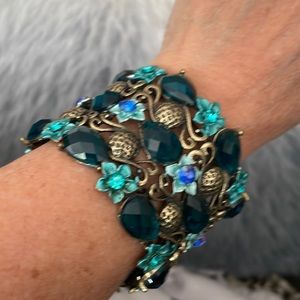 Bangle with brushed gold, turquoise & light blue that adjusts to any size